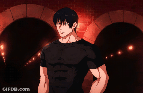 A Man In A Black Shirt Is Holding A Gun In A Tunnel GIF