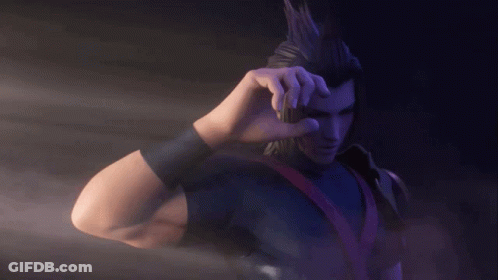 A Man In A Black Shirt Is Holding Something In His Hands GIF