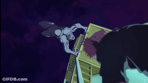 A Man In A Black Shirt Is Leaning On A Railing On A Set Of Stairs GIF