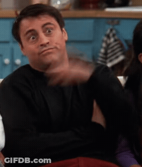 A Man In A Black Shirt Is Making A Face GIF