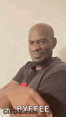 A Man In A Black Shirt Is Making A Funny Face And Says `` Byeeee '' . GIF