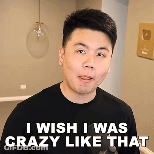 A Man In A Black Shirt Is Making A Funny Face And Says I Wish I Was Crazy Like That GIF