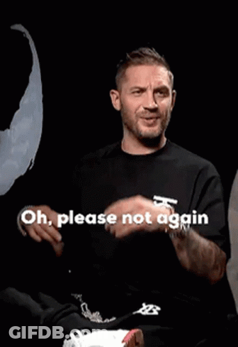 A Man In A Black Shirt Is Making A Funny Face And Says Oh Please Not Again GIF