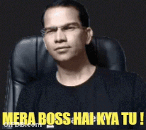 A Man In A Black Shirt Is Sitting In A Chair With The Words Mera Boss Hai Kya Tu GIF