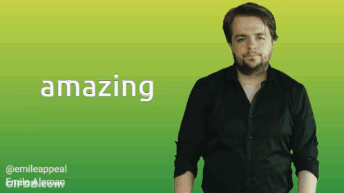 A Man In A Black Shirt Is Standing In Front Of A Green Background With The Word Amazing On It GIF