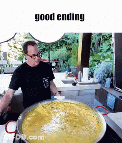 A Man In A Black Shirt Is Standing In Front Of A Large Pan Of Soup With The Words Good Ending Written Above Him GIF