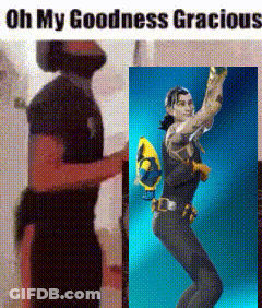 A Man In A Black Shirt Is Standing Next To A Picture Of A Man In A Black Shirt Holding A Gun . GIF