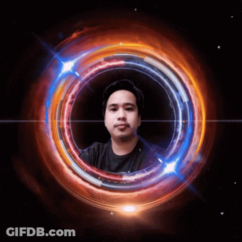 A Man In A Black Shirt Is Surrounded By A Glowing Circle GIF
