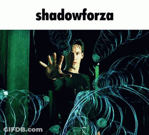 A Man In A Black Shirt Is Surrounded By Barbed Wire And The Word Shadow Forza Is Above Him GIF