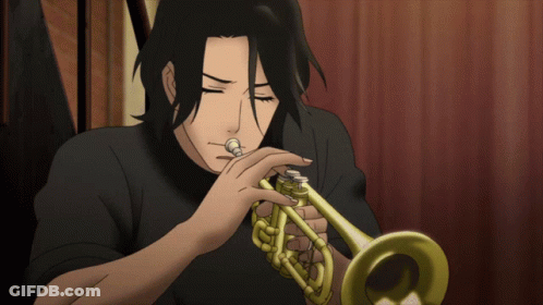 A Man In A Black Shirt Plays A Trumpet With His Eyes Closed GIF