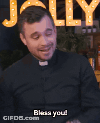 A Man In A Black Shirt Says Bless You GIF