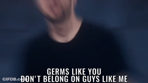 A Man In A Black Shirt Says Germs Like You Don 'T Belong On Guys Like Me In A Dark Room GIF