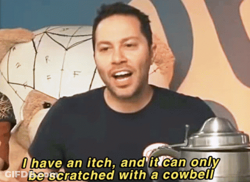 A Man In A Black Shirt Says " I Have An Itch And It Can Only Be Scratched With A Cowbell " GIF