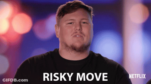 A Man In A Black Shirt Says Risky Move In White Letters GIF