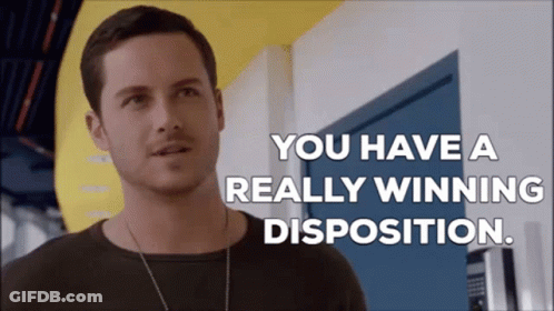 Man In Black Shirt Saying You Have A Really Winning Disposition GIF