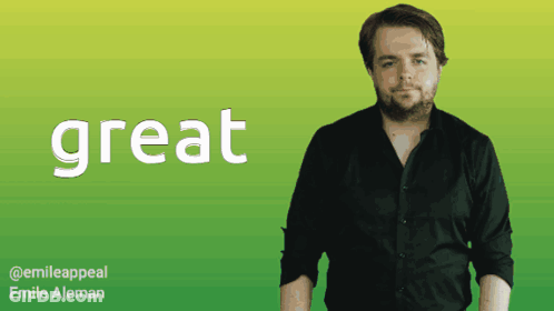 A Man In A Black Shirt Stands In Front Of A Green Background With The Word Great In White Letters GIF