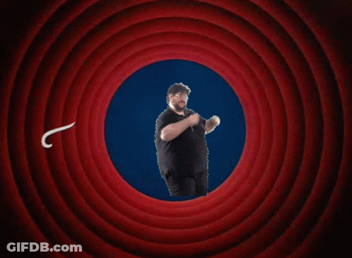 A Man In A Black Shirt Stands In Front Of A Red Circle That Says " That 'S All Folks ! " GIF