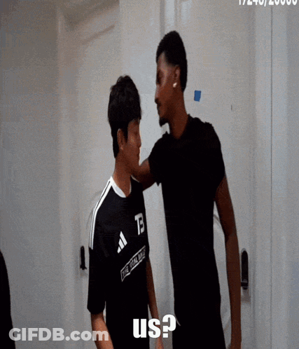A Man In A Black Shirt With The Letter Tb On It GIF