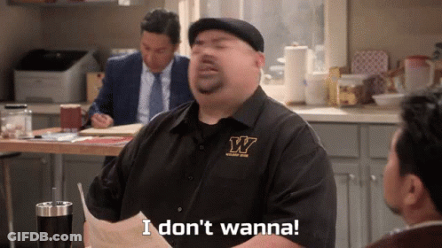 A Man In A Black Shirt With The Letter W On It Says I Don 'T Wanna GIF