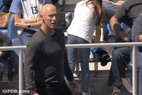 A Man In A Black Shirt With The Number 13 On His Shirt GIF