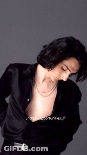 A Man In A Black Shirt With The Words Endless Opportunities On The Bottom Right GIF