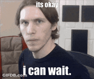 A Man In A Black Shirt With The Words I Can Wait GIF