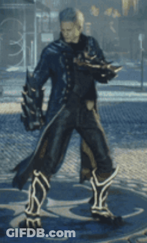 A Man In A Black Suit And Boots Is Dancing GIF
