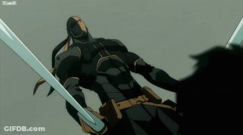 A Man In A Black Suit Is Holding Two Swords And A Xcomgif Is Below Him GIF
