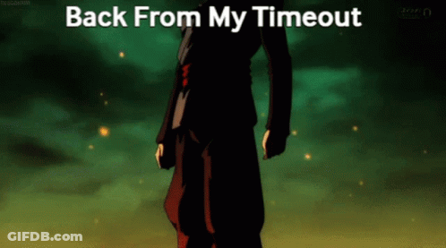 A Man In A Black Suit Is Standing In Front Of A Green Background With The Words Back From My Timeout GIF