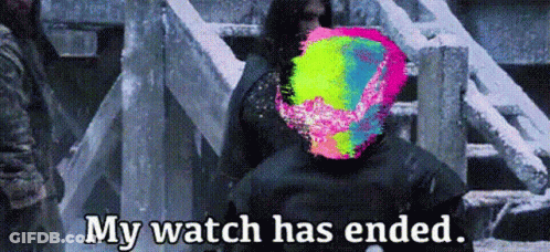 A Man In A Black Suit Is Standing In Front Of A Snowy Staircase With A Colorful Face . GIF