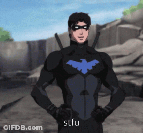 A Man In A Black Suit With A Blue Bird On His Chest Is Standing With His Hands On His Hips And The Word Stfu Below Him GIF