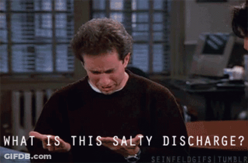 A Man In A Black Sweater Is Asking What Is This Salty Discharge GIF