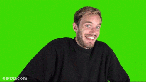 A Man In A Black Sweater Is Making An Ok Sign On A Green Screen GIF