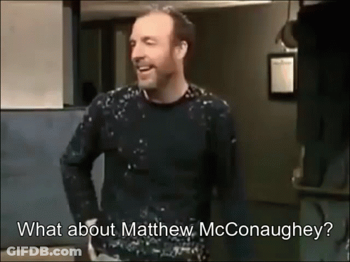 A Man In A Black Sweater Is Talking About Matthew Mcconaughey . GIF