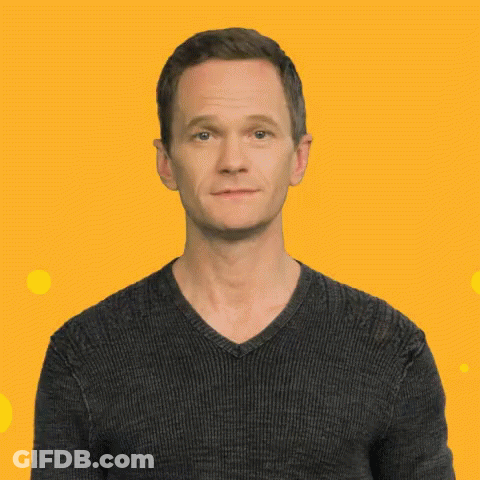 A Man In A Black Sweater Making A Funny Face GIF