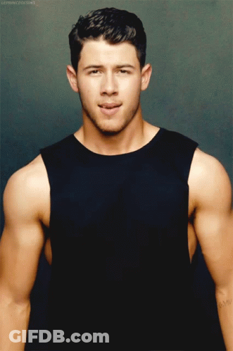 A Man In A Black Tank Top Has A Tattoo On His Arm That Says ' Amy ' GIF