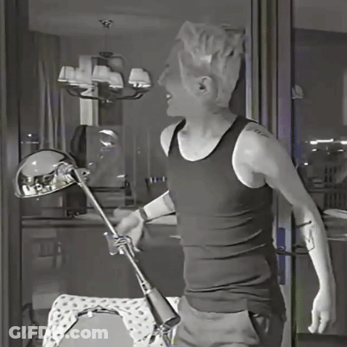 A Man In A Black Tank Top Has A Tattoo On His Arm That Says " I Love You " GIF
