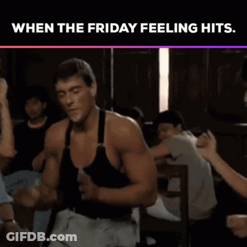 A Man In A Black Tank Top Is Dancing In A Bar While A Woman Looks On . GIF