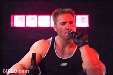 Man In Black Tank Top Holding Beer And Smoking GIF