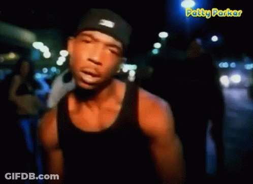 A Man In A Black Tank Top Says It 'S Murdaa GIF