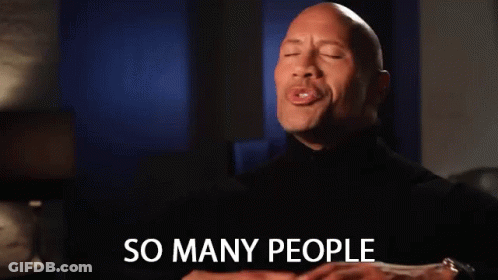 A Man In A Black Turtleneck Is Smiling And Says So Many People GIF