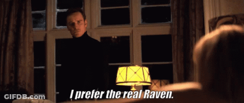 A Man In A Black Turtleneck Stands In Front Of A Lamp And Says I Prefer The Real Raven GIF