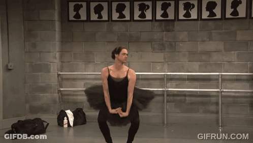 A Man In A Black Tutu Is Dancing In Front Of A Wall With Silhouettes Of Women On It GIF