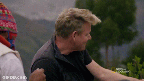 A Man In A Black Vest Is Being Interviewed By National Geographic GIF