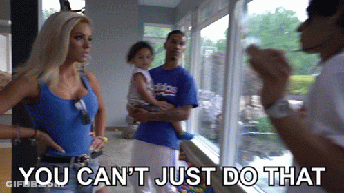 A Man In A Blue Adidas Shirt Is Holding A Child GIF