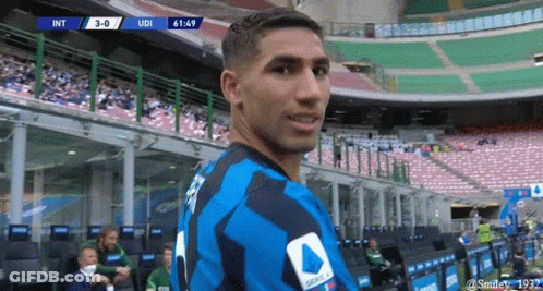 A Man In A Blue And Black Jersey With The Number 1 On The Back GIF