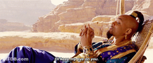 A Man In A Blue And Gold Outfit Is Laying In A Hammock And Says " I 'Ll Keep My Eye On You " GIF