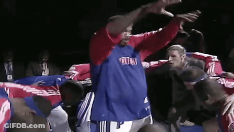 A Man In A Blue And Red Shirt With The Word Pistons On It GIF