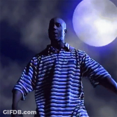 A Man In A Blue And White Striped Shirt Is Dancing In Front Of A Blue Moon . GIF