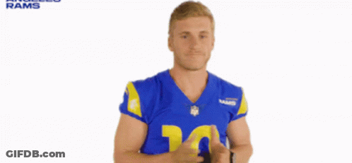 A Man In A Blue And Yellow Rams Jersey GIF